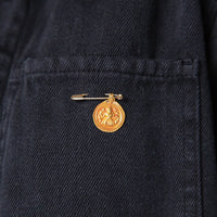 Gold Safety Pin by Blanca Monrós Gómez